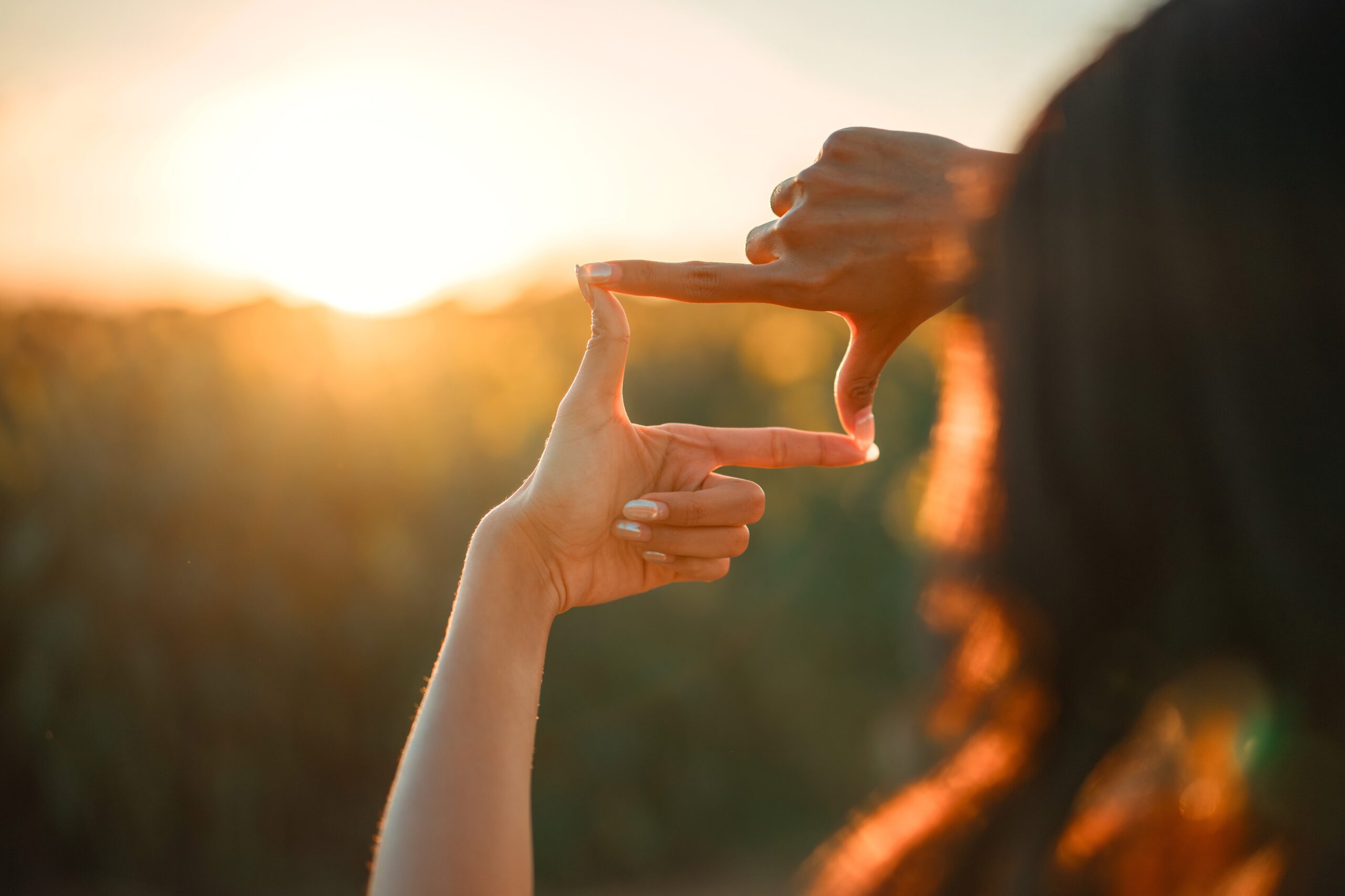Closeup,Of,Woman,Hands,Making,Frame,Gesture,With,Sunset,,Female